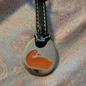 Dooney & Bourke Tag leather hang tag